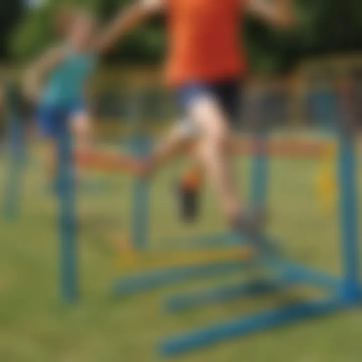 Children jumping over agility hurdles