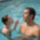 Instructor demonstrating proper breathing technique in swimming lesson