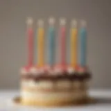 A stylish arrangement of Roman numeral birthday candles on a festive cake